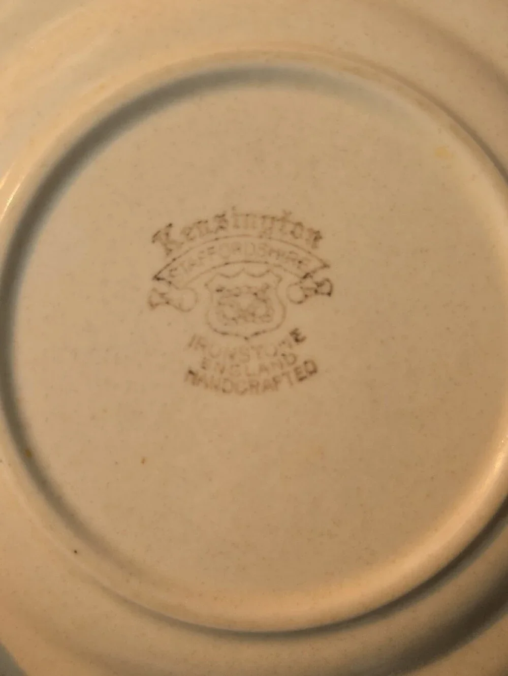 Cream Scalloped Dinner Plate with Brown Trim